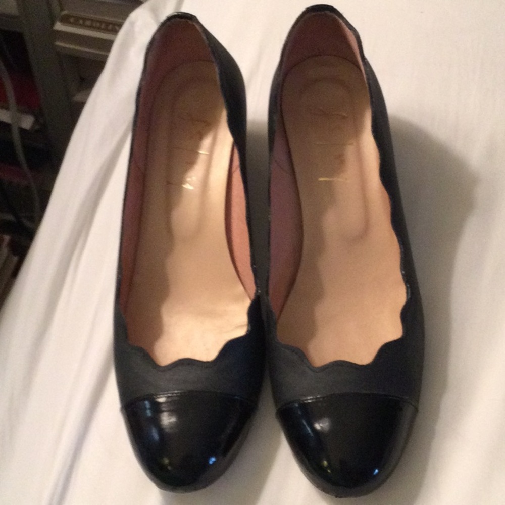 Black glazed linen scalloped fs/ny (French Sole New York) black captoe wedges.